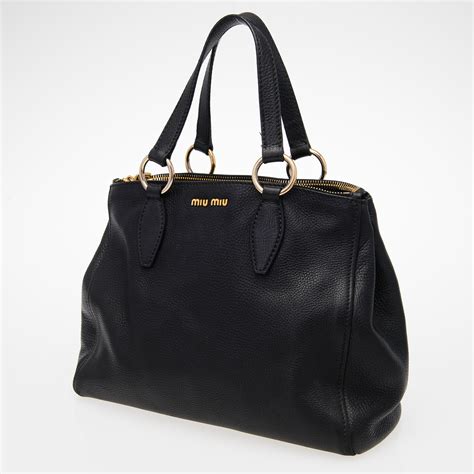 miumiu leather totes.